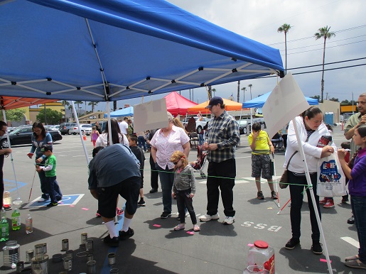 a crowd of people enjoying the carnival