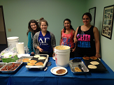 The Delta Gamma sorority volunteers making the pancake breakfast for the fundraiser.