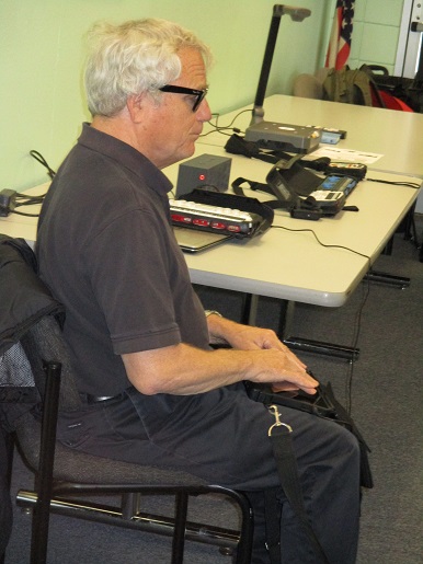 Bob Sweetmen from Sweetmen Systems demonstrating the humanware Braille touch braille note