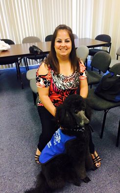 Priscilla with a black guide dog