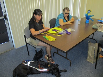 Christine and Teresa are learning Braille.