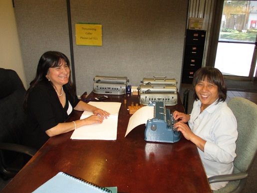 Yvonne Holstein and Christine Davidson in Braille Class.