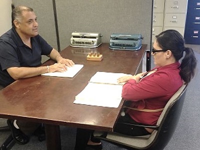 Braille Instructor Ciro Trujillo and his student Octavia learning Braille