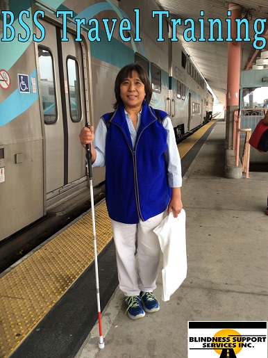 Yvonne at the Train Station for her training by Blindness Support Services