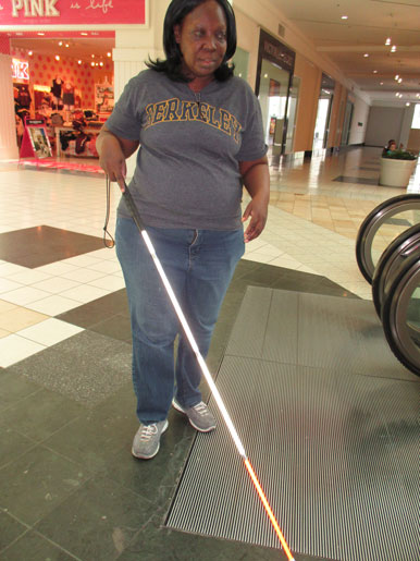 Bobbie Brown entering on to an escalator