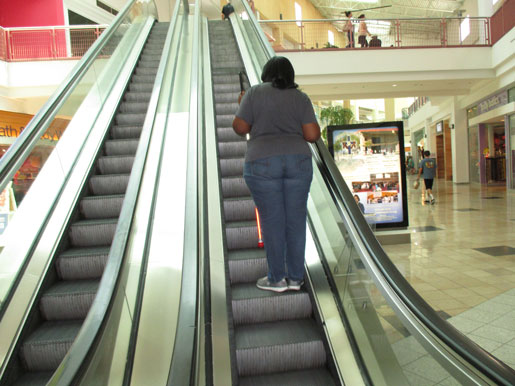 Riding on an escalator safely