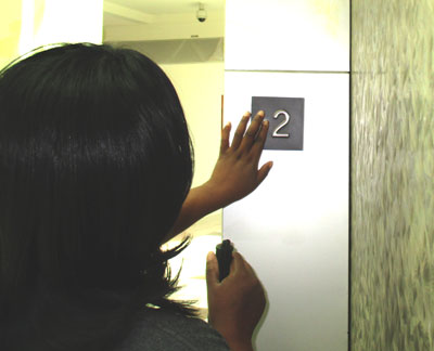 Bobbie is learning that there are two types of tactile information on the elevator door panal, one is in Braille