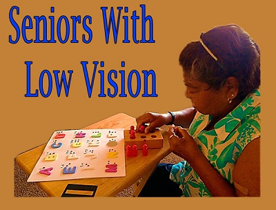 seniors with low vision learning with Braille teaching props.