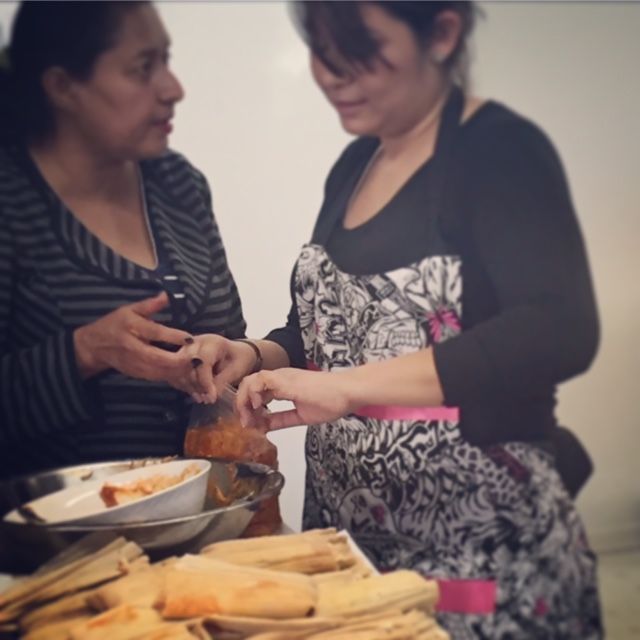Veronica and Tony making tamales in the ils class for Older Adults.