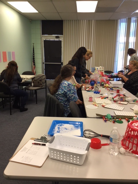 This teacher training event involves putting together tactile teaching props.