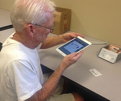 Richard is learning how to use his iPad in Assistive Technology