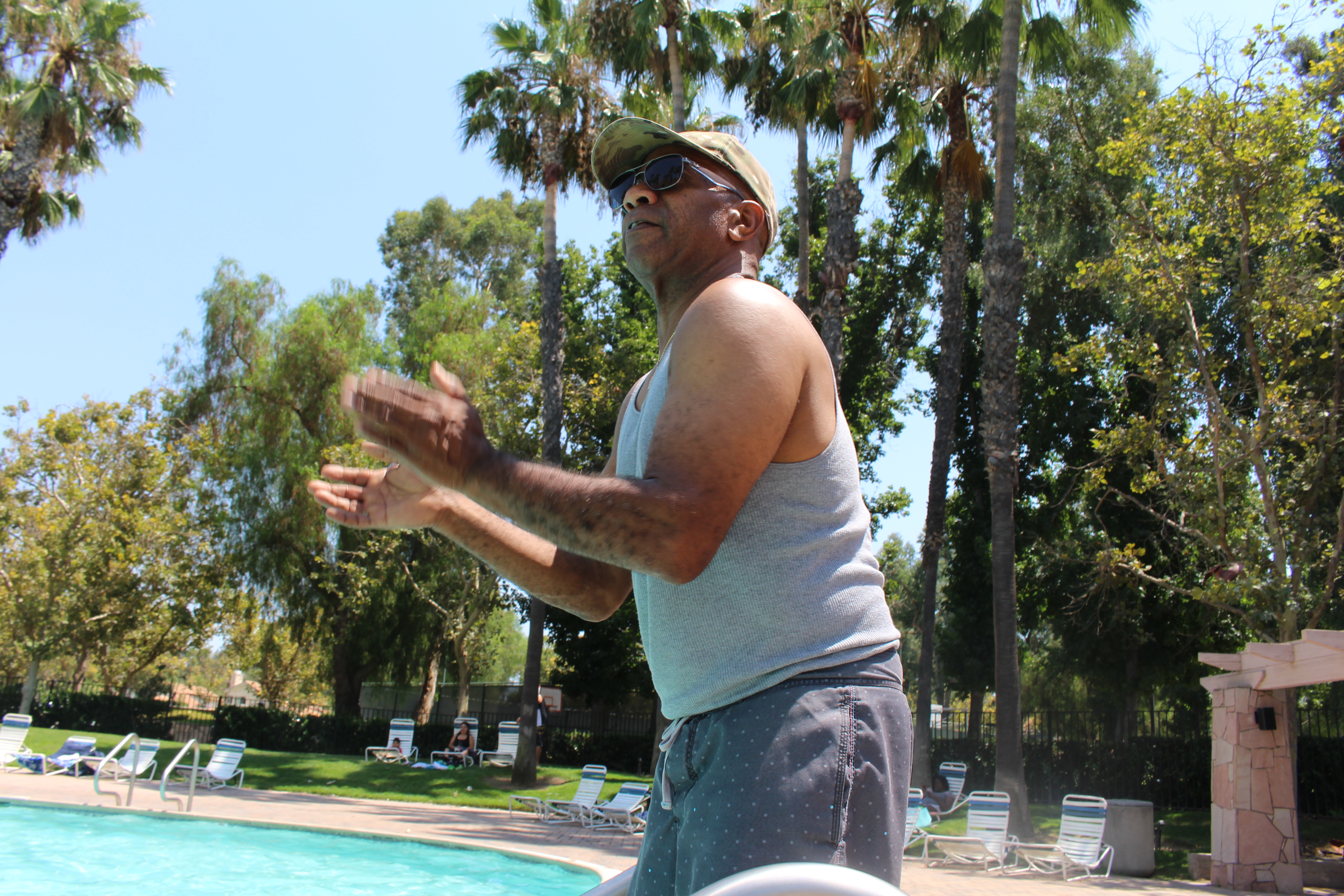 Jose providing encouragement from the side of the pool