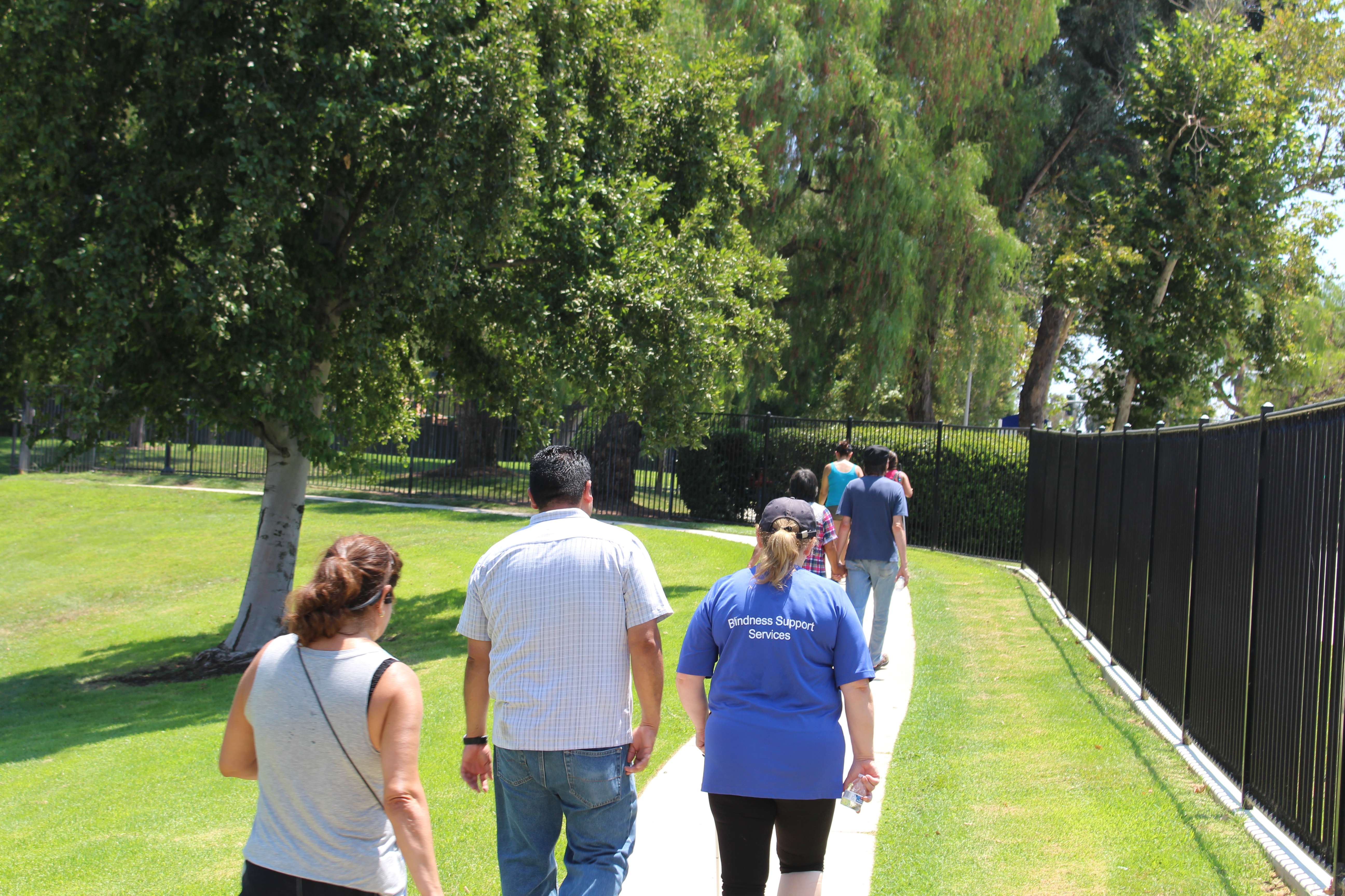 A group that splintered off during lunch returning from the end of the walking path